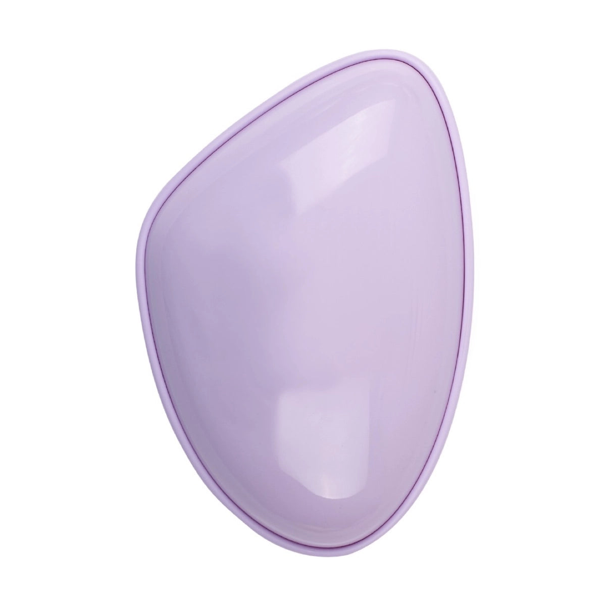Travel-size hair brush for convenient styling on the go.