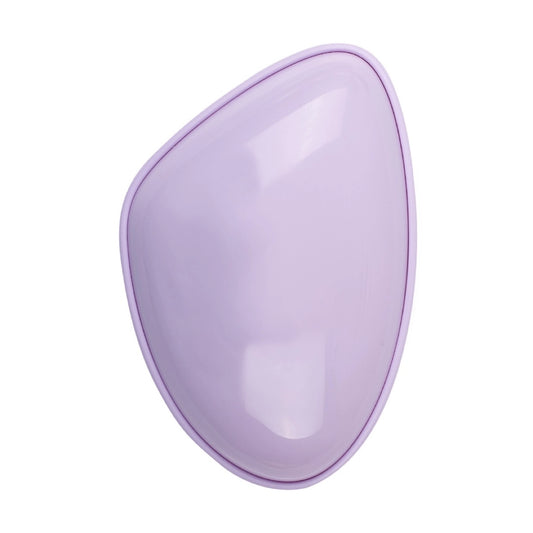 Travel-size hair brush for convenient styling on the go.