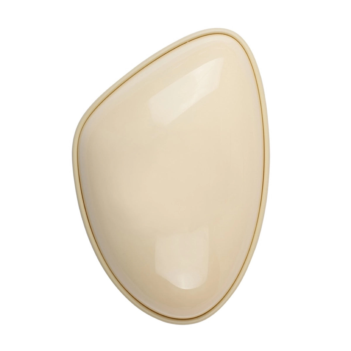 Mini hair brush for quick touch-ups and daily styling.
